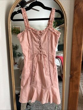 Pink Lace-Up Ruffle Mini Dress Urban Outfitters